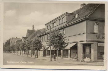 AK Foto Bad Wilsnack Große Straße mit Konsum 1951