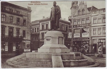 AK Graudenz Grudziądz Kaiser Wilhelm-Denkmal mit Geschäften Westpreußen Polen Feldpost 1915