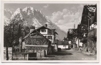 AK Foto Garmisch-Partenkirchen Frühlingstraße mit Zugspitzgruppe 1940