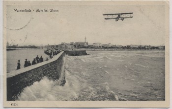 AK Warnemünde Mole bei Sturm mit Flieger Rostock Feldpost 1918