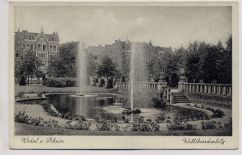 AK Wesel am Rhein Willibrodiplatz mit Brunnen und Häusern 1940