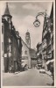 AK Ravensburg Marktstraße mit Auto und Menschen 1950