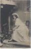 AK Foto Frau am Herd sitzend Reutlinger 1911