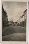 AK Foto Fürstenberg/Havel Thälmannstraße mit Geschäften 1955